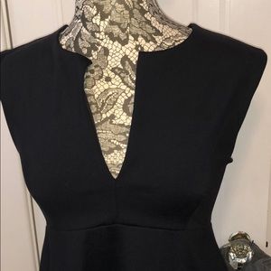 bebe Tops - Bebe low-cut peplum Top bebe Tops - Bebe low-cut peplum Top